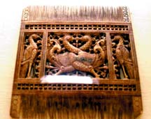 An ivory comb with hansa puttu motif. 