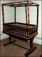 Baby crib made of ebony and satinwood